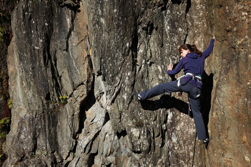 Woman rock climbing